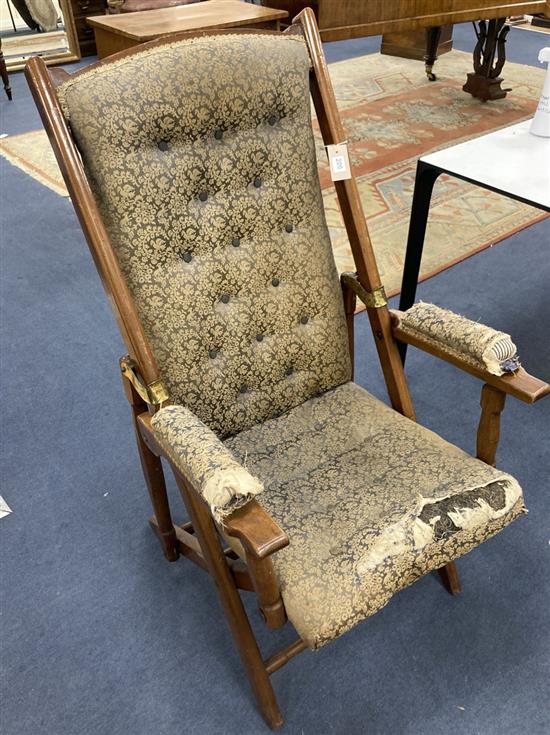 A late 19th / early 20th century mahogany folding campaign armchair
